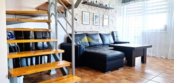 Mieszkanie dwupoziomowe z dwoma balkonami