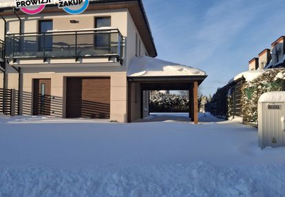 Nowy dom z garażem - słoneczny ogród