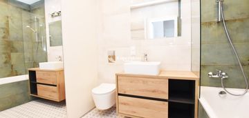 Apartament z ogródkiem i miejscem postojowym