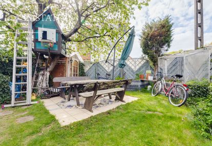 Duży ogród, obok centrum - mieszkanie + poddasze