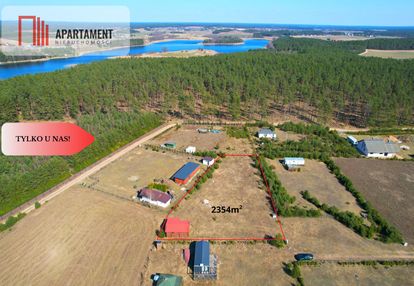 Działka rekreacyjna z domkiem letniskowym.