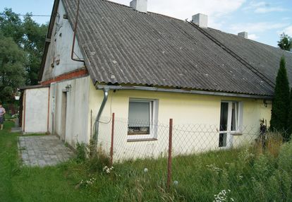 Pół domu skrajnego z działką i ogrodem