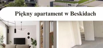 Prestiżowy dwupoziomowy apartament w ustroniu – malownicza okolica