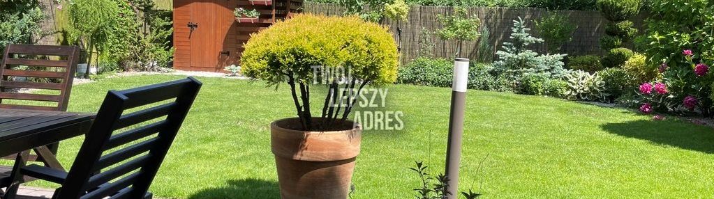 Dom z pięknie zagospodarowaną działką