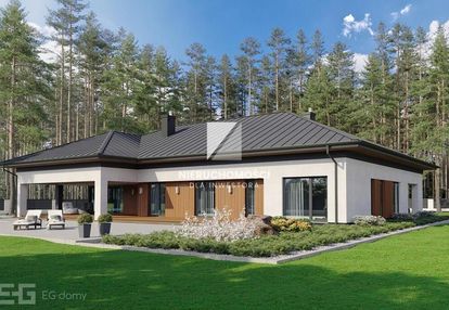 Działka budowlana otoczona lasem w pobliżu jeziora