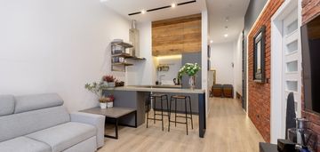 2-pokoje/ wys. 3,3m/ ogród 100m2/ garaż/ komórka