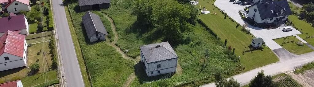 Na sprzedaż: działka budowlana z zabudowaniami