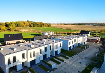 Nowoczesne domy w harmonii z naturą i technologią