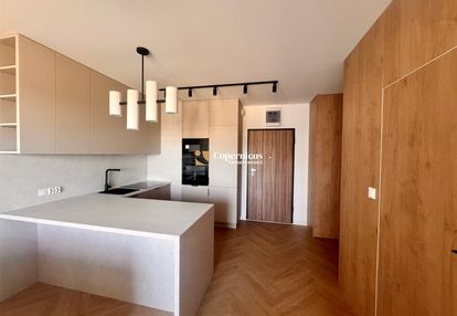 Nowocześnie wykończony apartament z ogródkiem