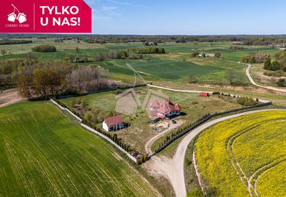 Dom ze stawem w pięknej okolicy - na sprzedaż