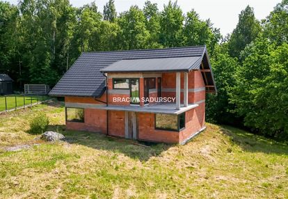 Dom pod lasem na widokowej działce