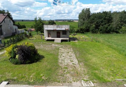 Działka z budynkiem po sklepie