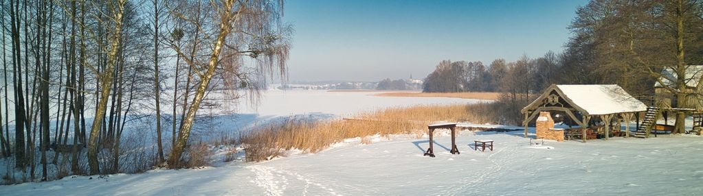Olsztyn, dom z bala z linią brzegową
