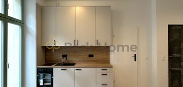 Kawalerka w kamienicy w centrum poznania