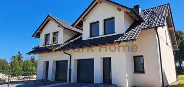 Dom w zabudowie bliźniaczej z garażem