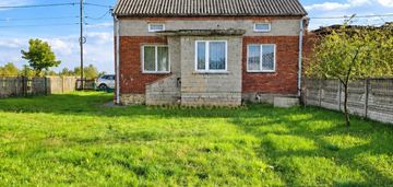 Różanna – działka 1186 m² z  zabudowaniami