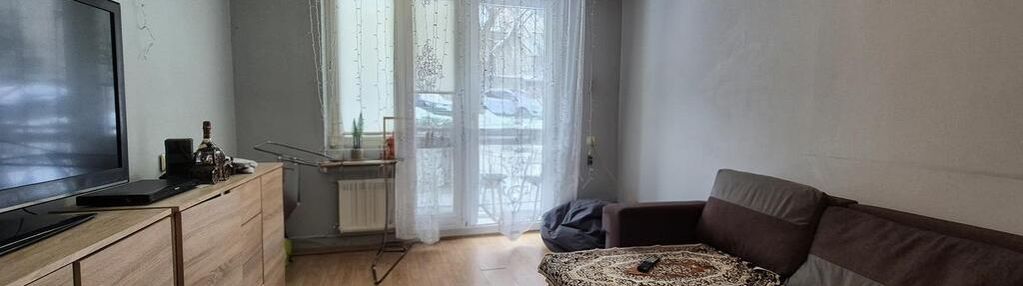 Mieszkanie na parterze w bloku/zabudowany balkon