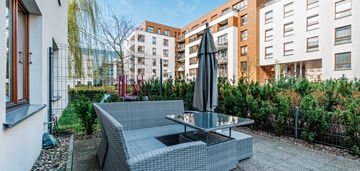 Kawalerka na garnizonie z ogródkiem i halą garażow