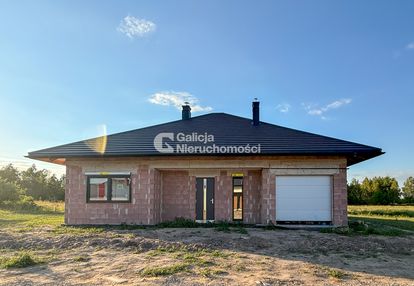Parterówka, elewacja, 10 arów, garaż, gaz