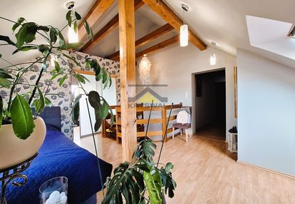 Dwupoziomowe mieszkanie z narożnym tarasem