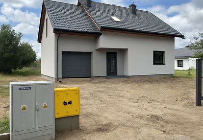 Dom wolnostojący w otoczeniu zieleni - osowiec
