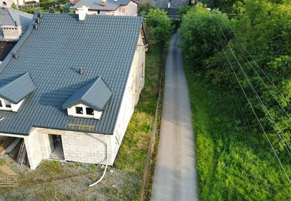 Dom z działką 892 m² i nowym dachem – buczkowice