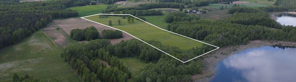 Działka z linią brzegową jeziora hołny