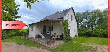 Dom z dużą działką i stawem w spokojnej okolicy
