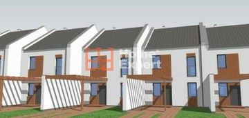 Domy parterowe w zabudowie szeregowej w rogowie