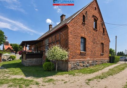 Urokliwy dom z cegły obok jeziora stryjewo