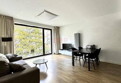 Elegancki apartament z widokiem na zieleń