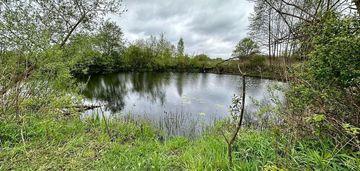 ** piękna działka z własnym jeziorem **