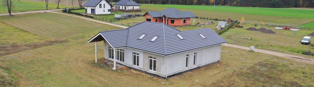 Atrakcyjna działka z nowym domem jednorodzinnym