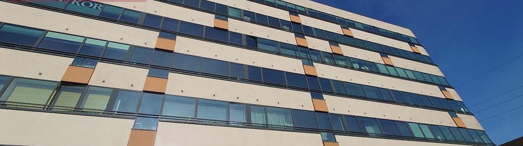 Dwa mieszkania połączone inwestycja z garazami