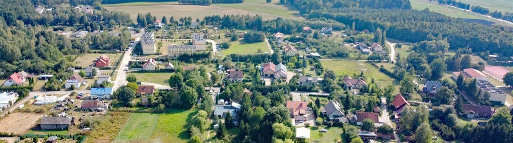 Ostatnia działka w centrum wsi szyldak.