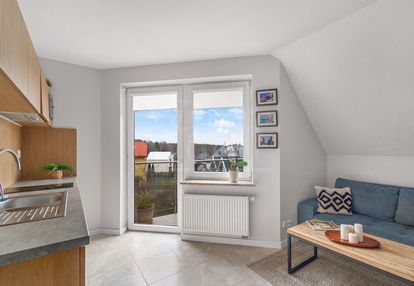 Dupoziomowy apartament z dwoma balkonami