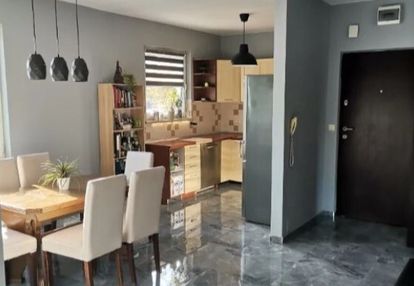 Mieszkanie o pow. 58 m² z ogródkiem i parkingiem.