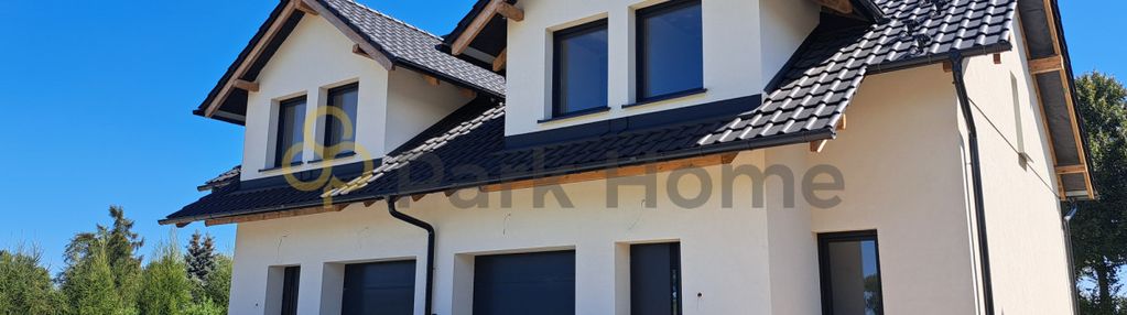 Dom w zabudowie bliźniaczej z garażem