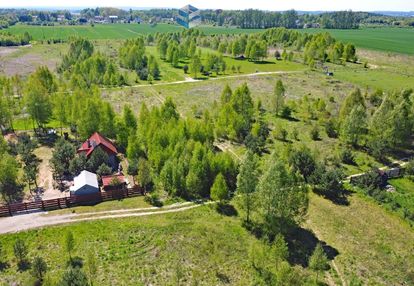 Ostrowin-działki przy lesie nieopodal jeziora.