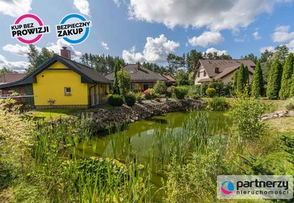 Dom, własny kawałek lasu i staw