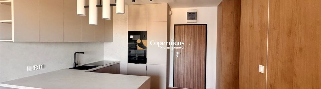 Nowocześnie wykończony apartament z ogródkiem