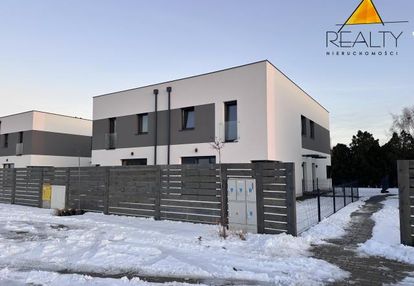 Nowoczesne mieszkania dwukondygnacyjne z ogródkami