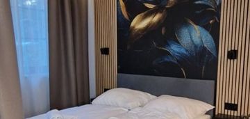 Apartament z balkonem i garażem