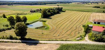Działka budowlana z zarybionym stawem