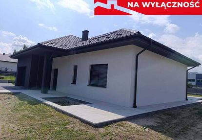 Nowy dom parterowy z antresolą.