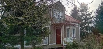 Dom, 2 bud. gosp., garaż - pow. 1 ha lub siedlisko