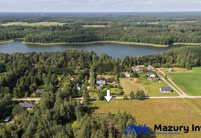 Działki budowlane w piasutnie - przy ścianie lasu i 230 m do jeziora