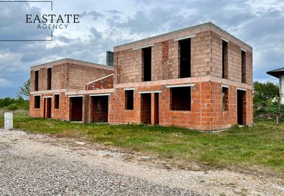 Bliźniak w stanie surowym otwartym/działka 500 m2