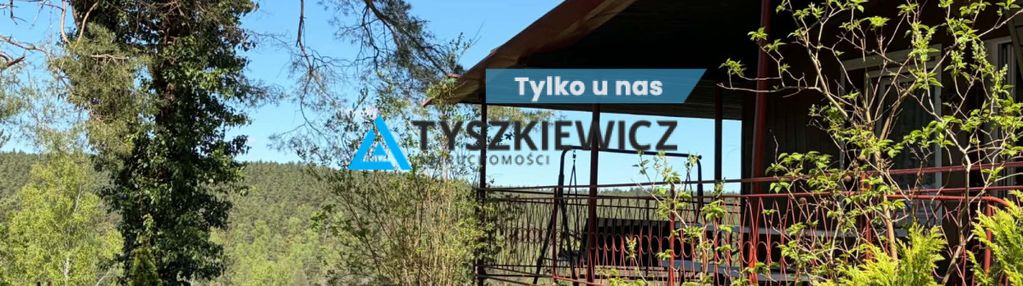 Domek w gołubiu z widokiem na jezioro dąbrowskie