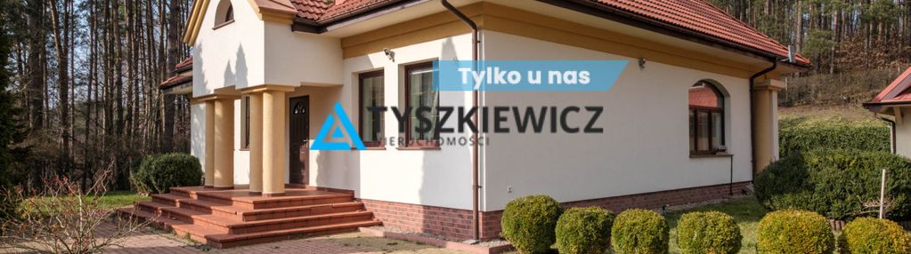Dom  w lesie nad jeziorem